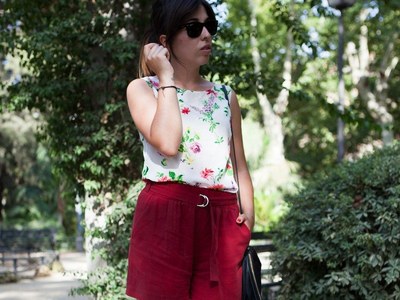 Red pants with blouses of flowers