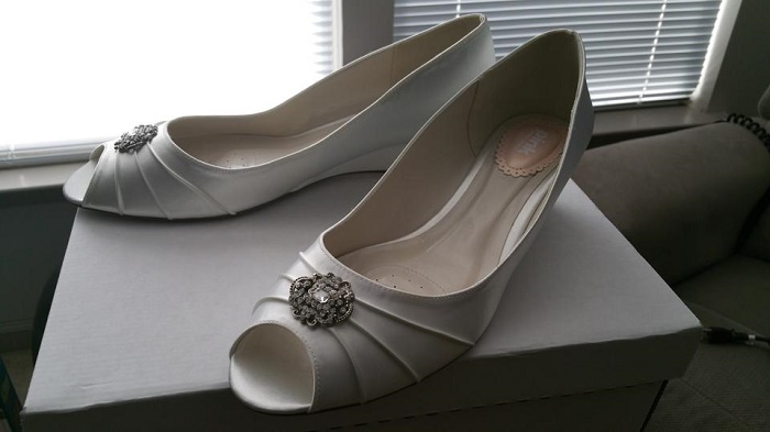 White bridal shoes with ornaments