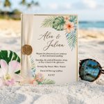 Tropical wedding invitation with pastel orchids on Florida sand.