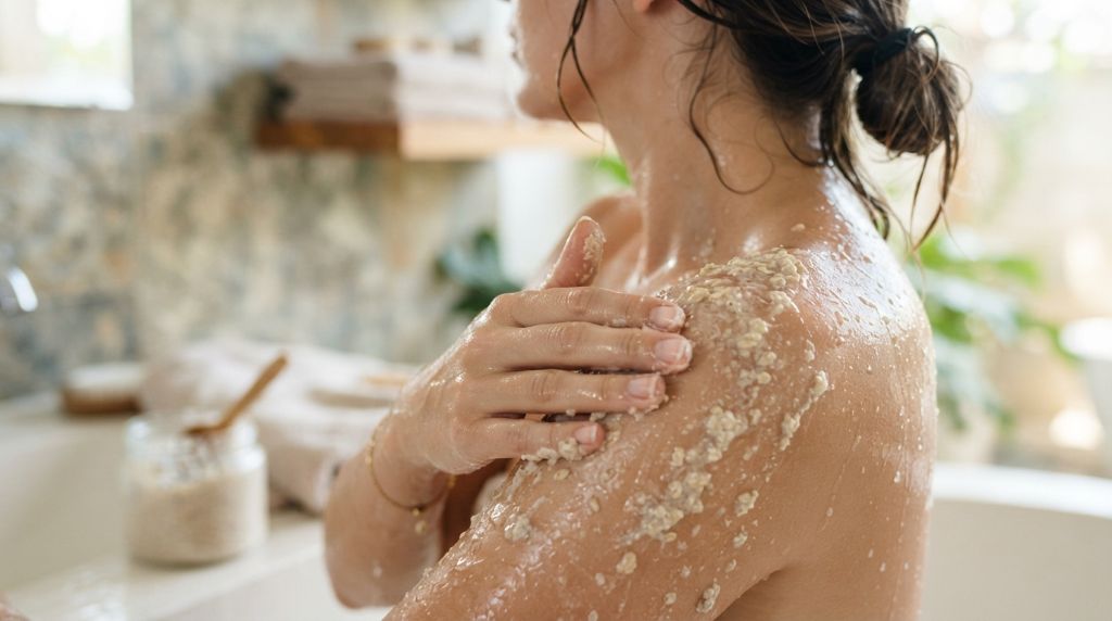 Applying a gentle exfoliating scrub to sensitive skin